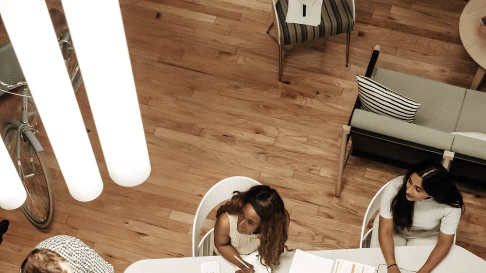 High-angle view of a diverse team collaborating on a project