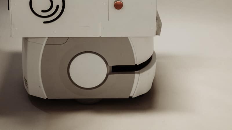 Close-up of an industrial robotic arm at work